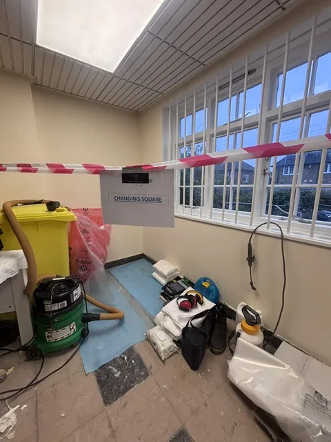 Asbestos floor tile and bitumen removal in Swiss Cottage